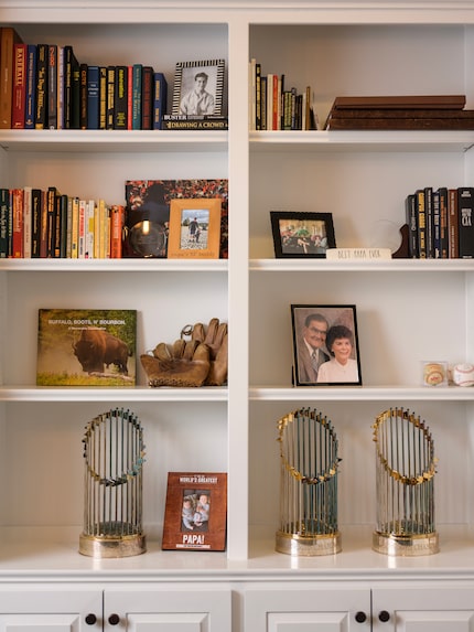 All 3 of Texas Rangers manager Bruce Bochy’s Commissioner's Trophies in his home office.

