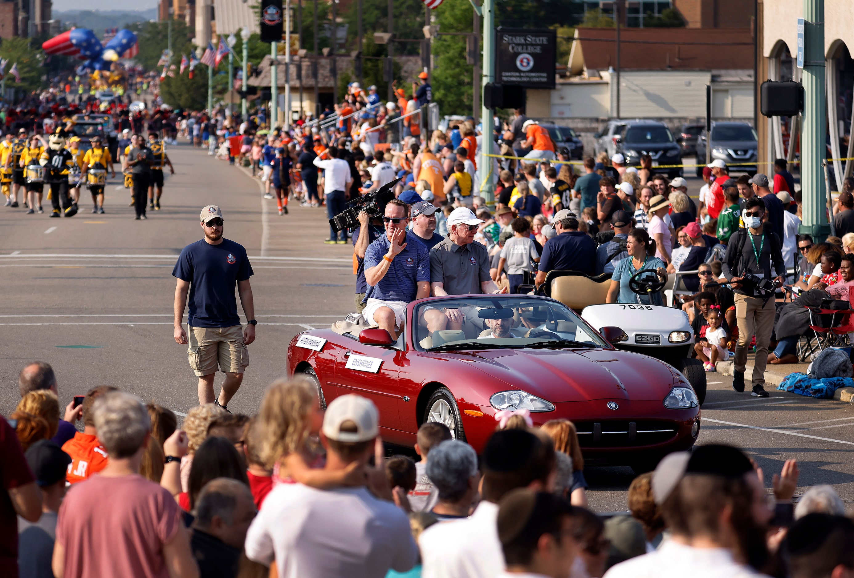 Indianapolis Colts quarterback and Pro Football Hall of Fame inductee Peyton Manning (in...