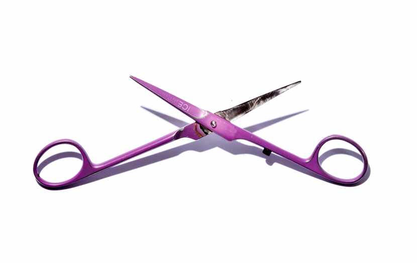The late Paul Neinast's favorite pair of purple hair scissors, photographed for The Dallas...