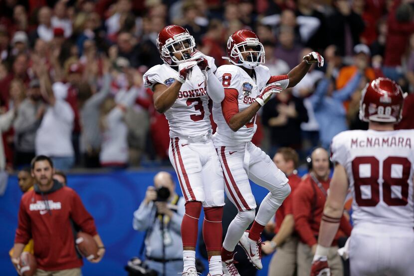 Oklahoma wide receiver Sterling Shepard (3) celebrates his touchdown receptions with wide...