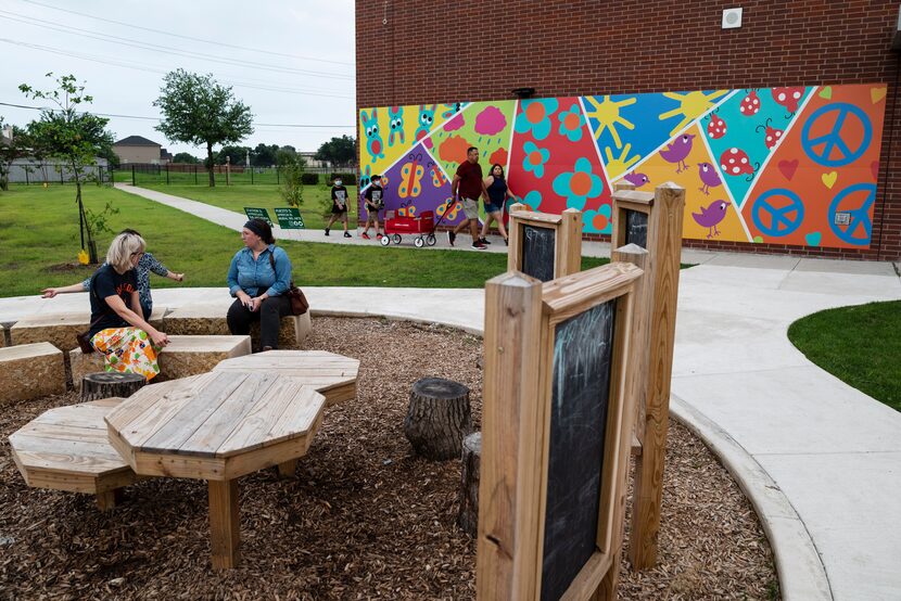 Families and parks advocates gathered Tuesday evening to celebrate the opening of the new...