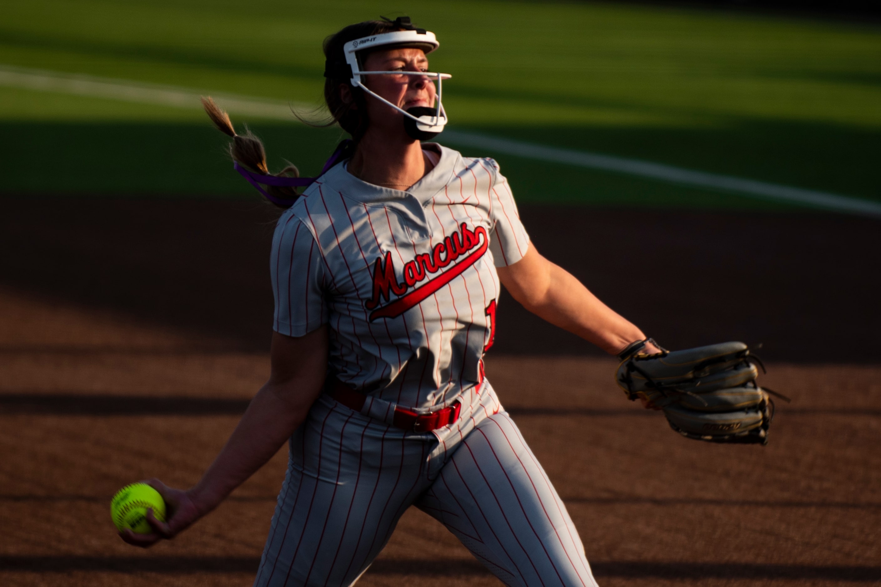 Flower Mound Marcus junior Faith Drissel (1) delivers a pitch during Game One of the Class...