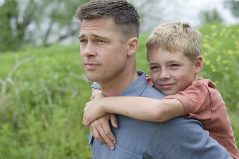 Brad Pitt (left) and Laramie Eppler star in The Tree of Life. 