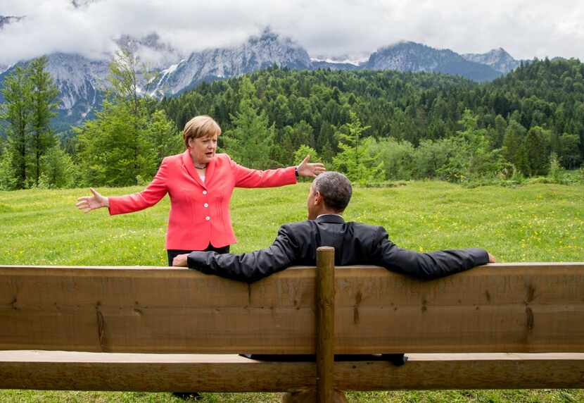 German Chancellor Angela Merkel speaks with then-President Barack Obama at Schloss Elmau...