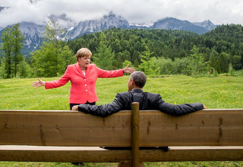 German Chancellor Angela Merkel speaks with then-President Barack Obama at Schloss Elmau...