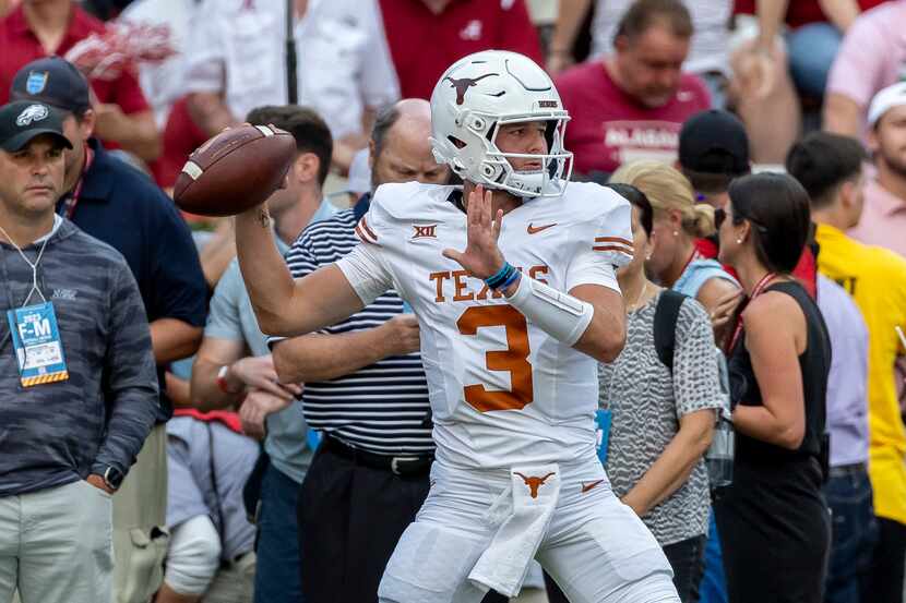 Texas quarterback Quinn Ewers (3) warms up before an NCAA college football game against...
