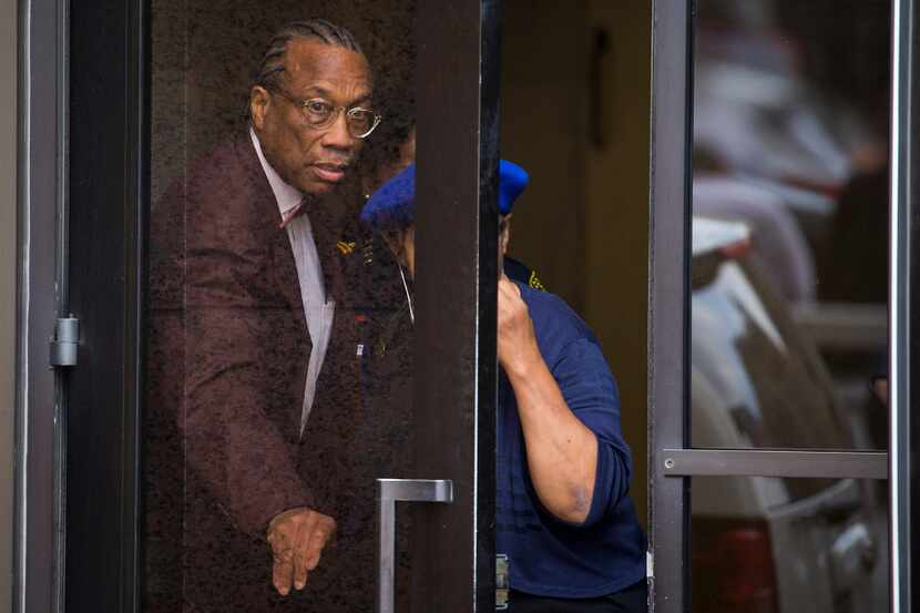 Dallas County Commissioner John Wiley Price departs the Earle Cabell Federal Building and...