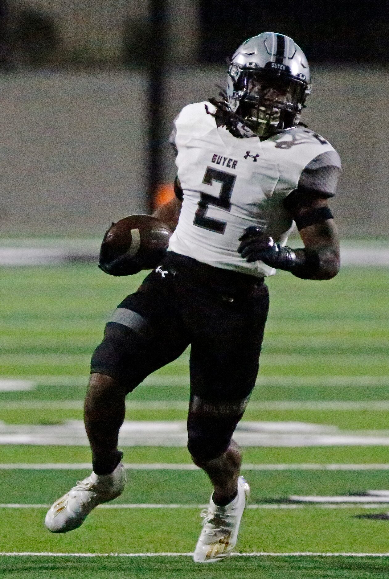 Denton Guyer High School defensive back Deuce Harmon (2) returns a punt during the second...