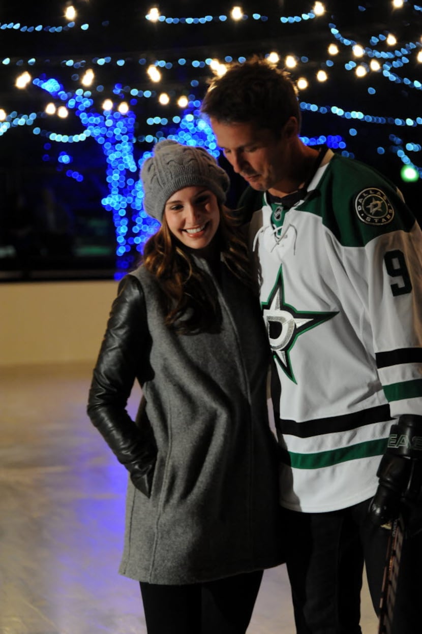 Mike Modano and wife Allison Micheletti skate on the ice at the grand opening of Sparkle...