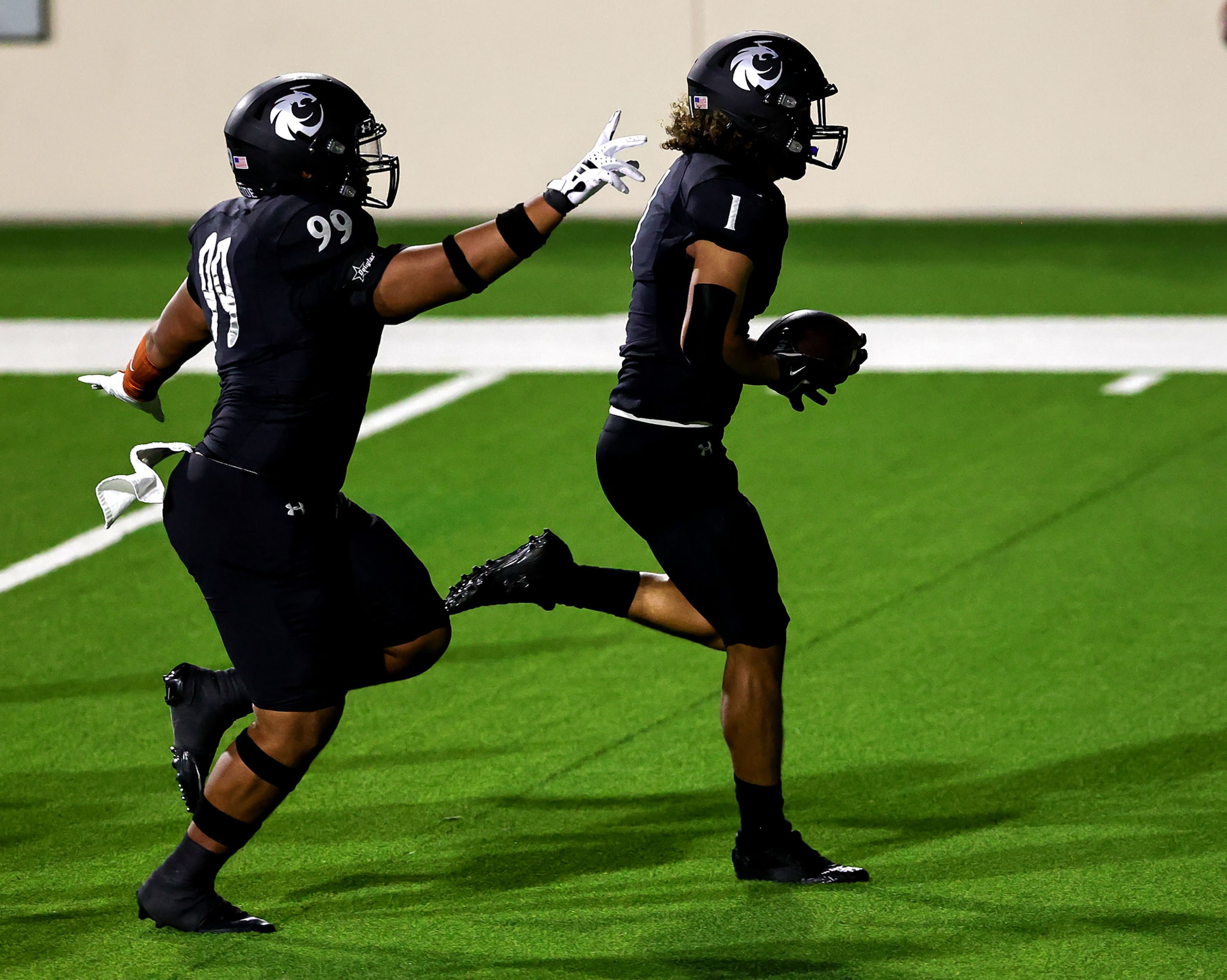 Denton Guyer running back Kaedyn Cobbs (1) goes untouched into the endzone for a touchdown...