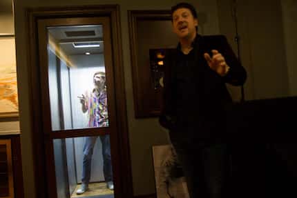 Randy Pitchford, left, and his father Randy Pitchford, demonstrate the "Dematerialization...