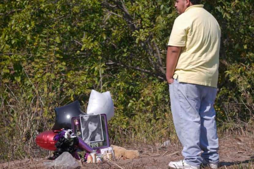 
Jason Martinez paid his respects to his classmate and friend Friday at a small memorial...