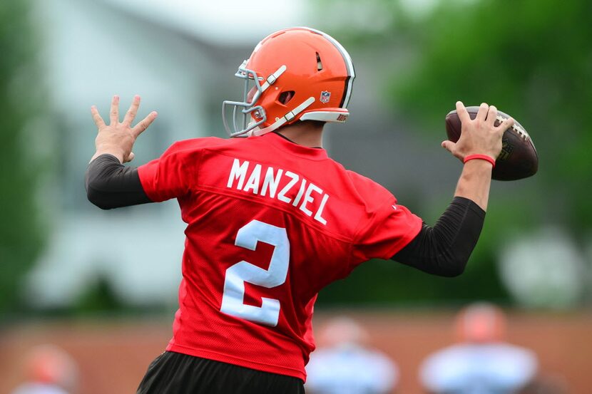 May 28, 2014; Berea, OH, USA; Cleveland Browns quarterback Johnny Manziel (2) throws a pass...