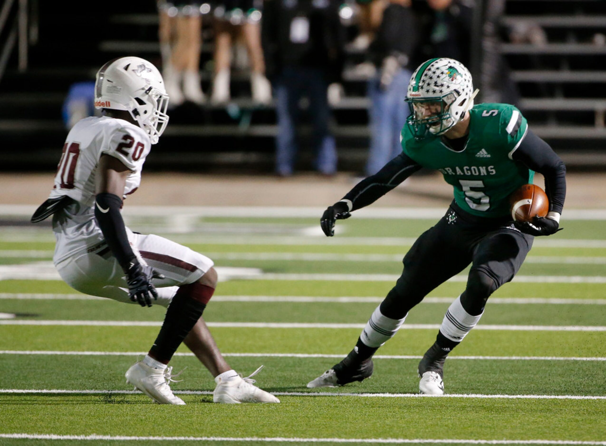 Southlake Carroll's Willis Meyer (5) tries to get past Lewisville's Keegan Brewer (20),...