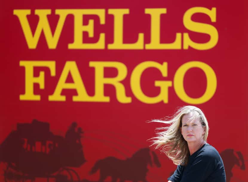 Rockwall resident Paige Portele in front of her Wells Fargo bank in Garland. She says she...