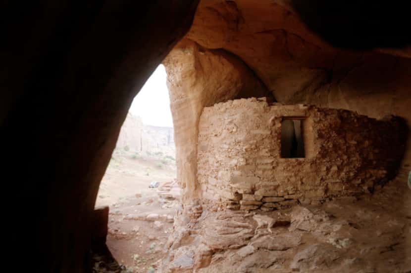 Anasazi ruins in the Monument Valley are reached via a short hike with the aid of a Navajo...
