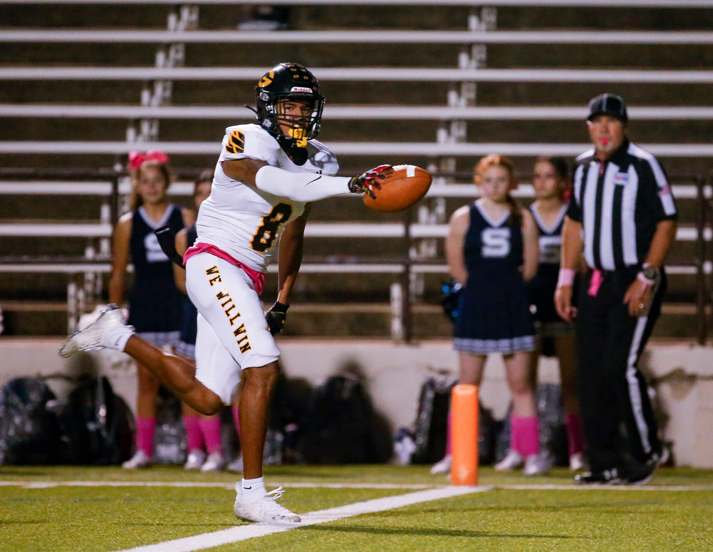 Garland’s WR Ellis Rogers (8) evades the Sachse defense for a touchdown during the first...