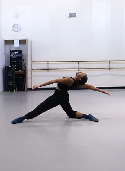 Dallas Black Dance Theatre company member Carmen Cage rehearses a scene from choreographer...