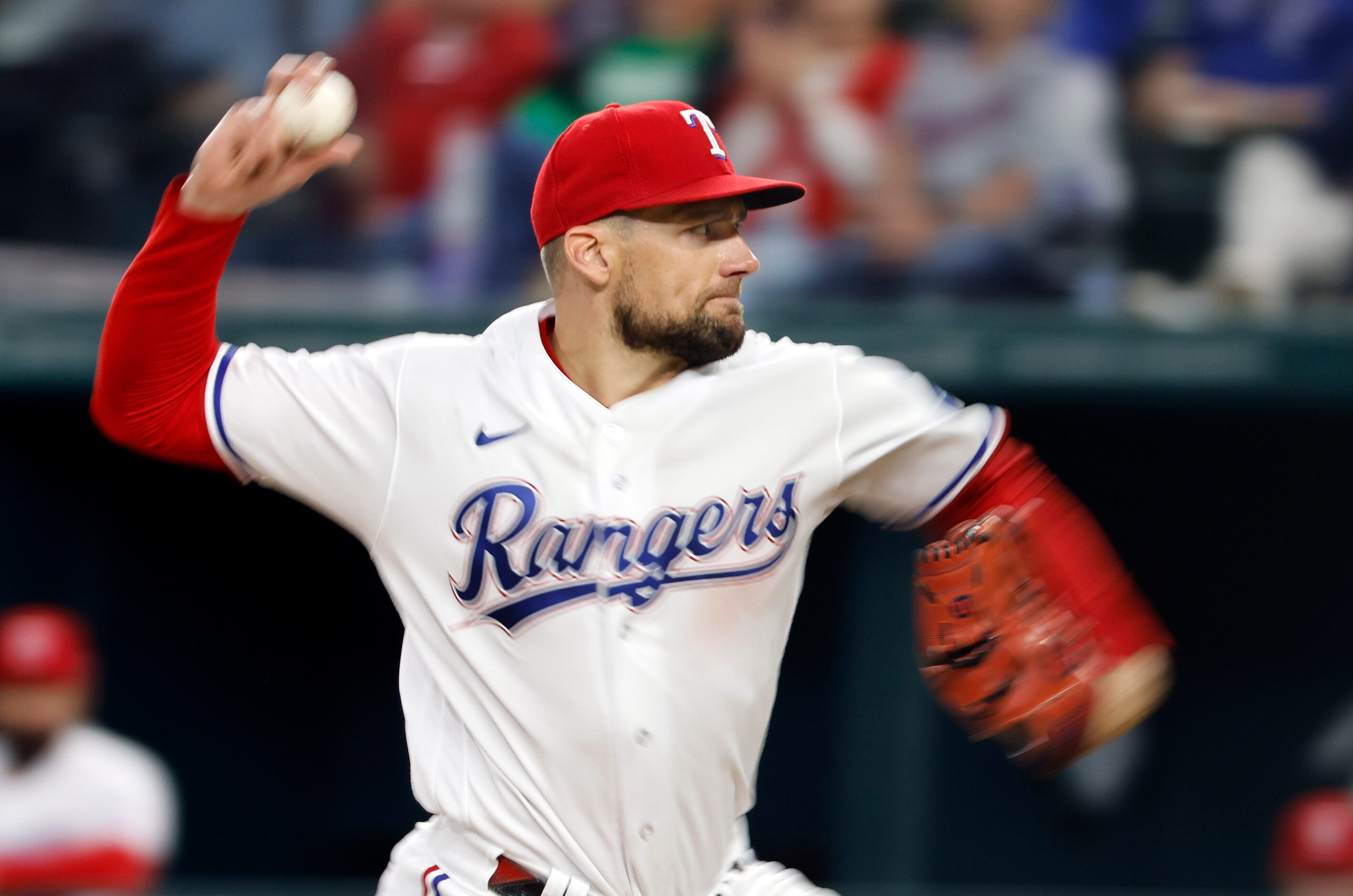 Texas Rangers starting pitcher Nathan Eovaldi (17) hurls a pitch to a New York Yankees...