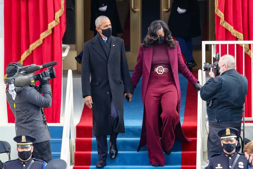 Former U.S. President Barack Obama and former first lady Michelle Obama arrive at the...