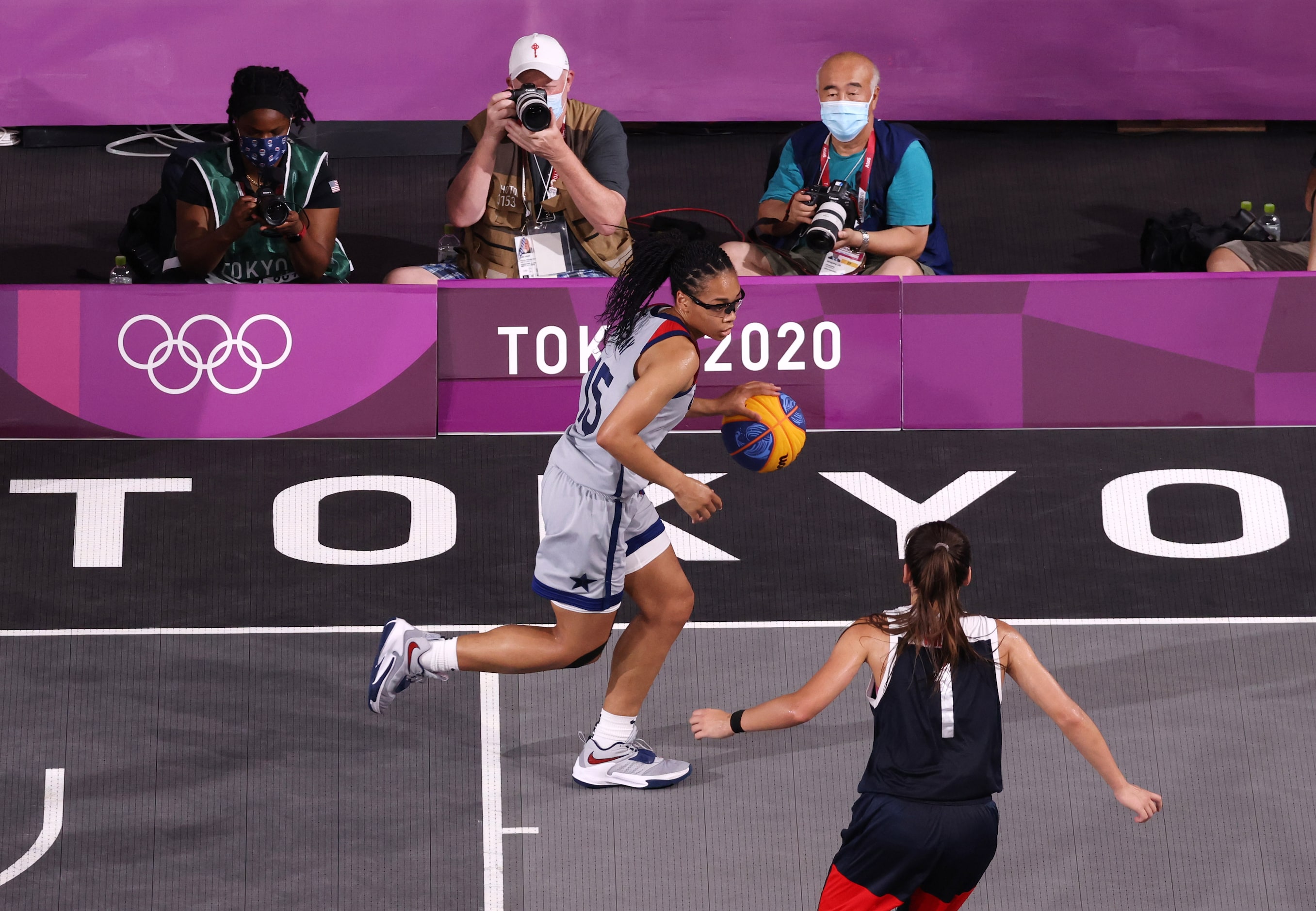 USA’s Allisha Gray (15) dribbles as she is defended by ROC’s Yulia Kozik (1) during the 3x3...