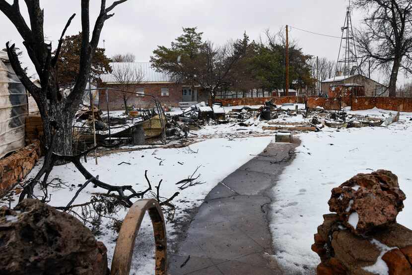 A sidewalk leads to a home destroyed by the Smokehouse Creek Fire, Thursday, Feb. 29, 2024,...