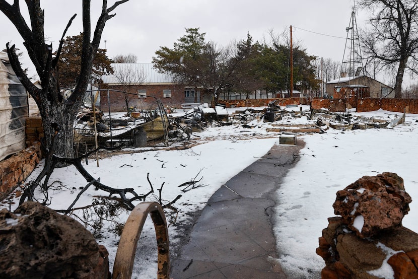 A sidewalk leads to a home destroyed by the Smokehouse Creek Fire, Thursday, Feb. 29, 2024,...