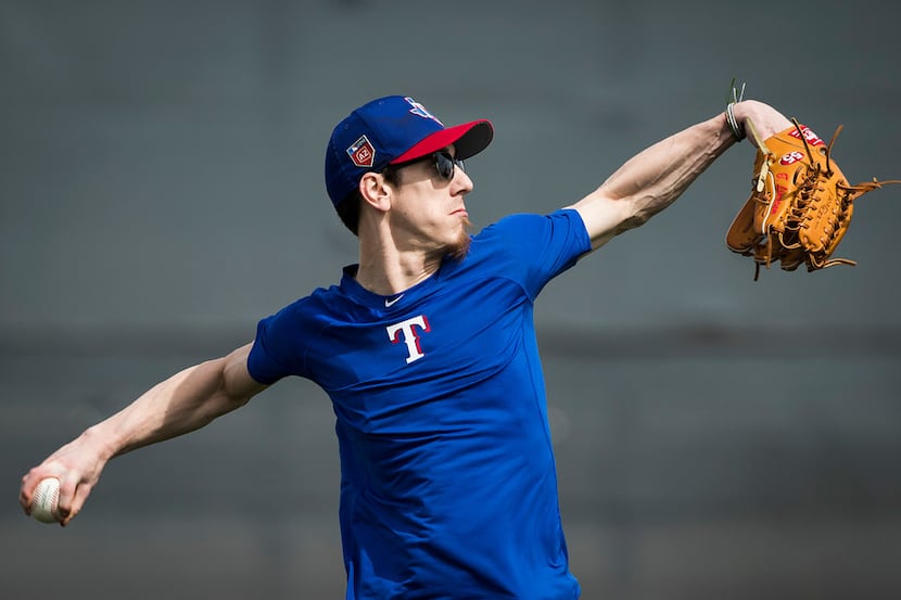 Texas Rangers pitcher Tim Lincecum works out at the team's spring training facility on...