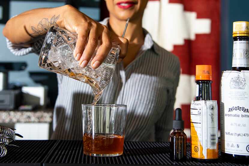 Bar Director Kimberly Schow prepares the “Dryced Tea” cocktail at Hotel Dryce in Fort Worth.