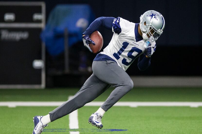 Dallas Cowboys wide receiver Amari Cooper (19) runs the ball during a Dallas Cowboys OTA...