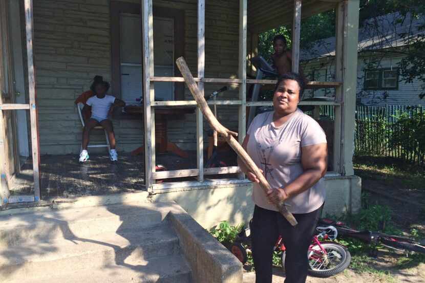 Netra Reese, shown in June 2016, keeps this stick by the porch of her Dallas home for...