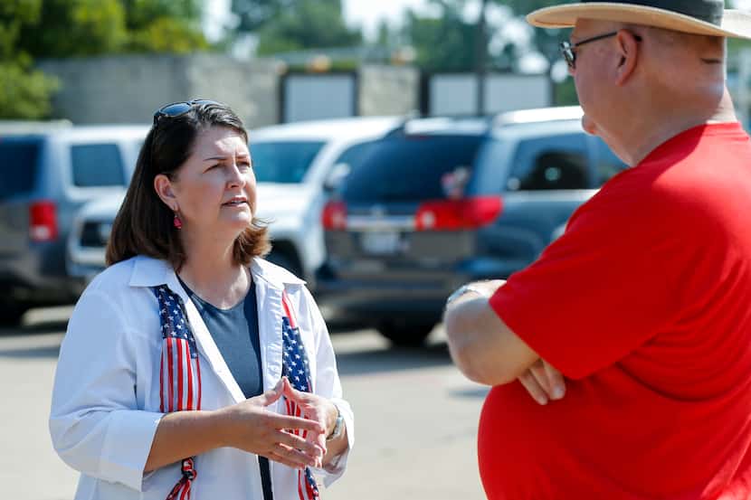 Susan Wright, Republican candidate for Texas’ 6th Congressional District (left), speaks with...
