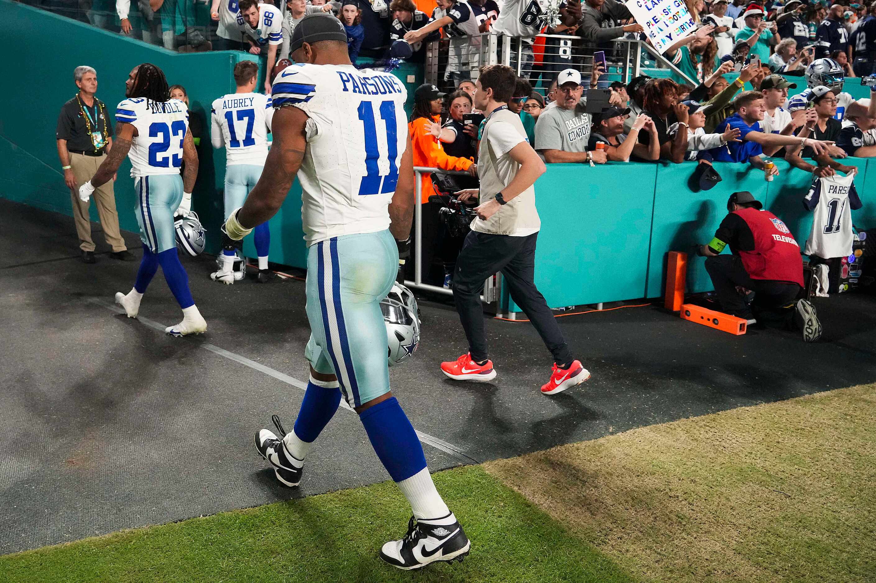 Dallas Cowboys linebacker Micah Parsons (11) leaves the field after a loss to the Miami...