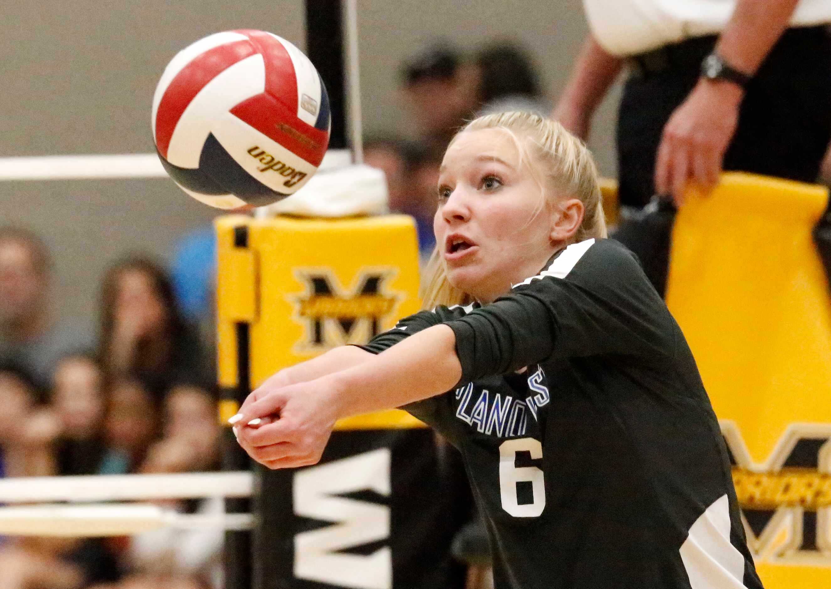 Plano West High School outside hitter Blaire Bowers (6) makes a pass during game one as...