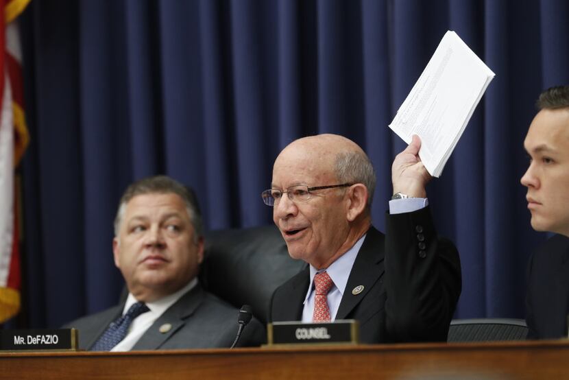 Rep. Peter DeFazio, D-Ore, ranking member on the House Transportation Committee holds up...