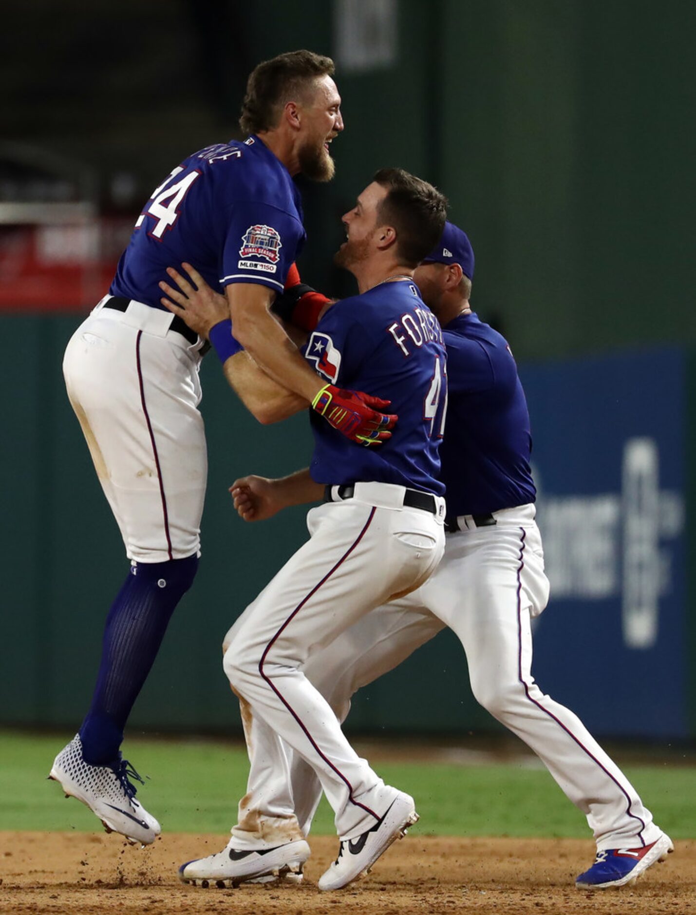 ARLINGTON, TEXAS - AUGUST 21:  Hunter Pence #24 of the Texas Rangers celebrates a walk off...