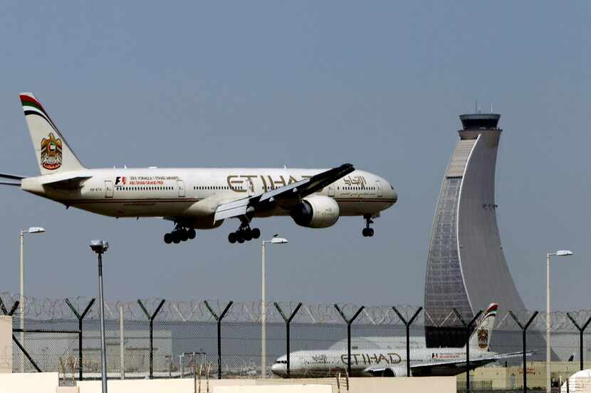  An Etihad Airways plane prepares to land at the Abu Dhabi airport in the United Arab...