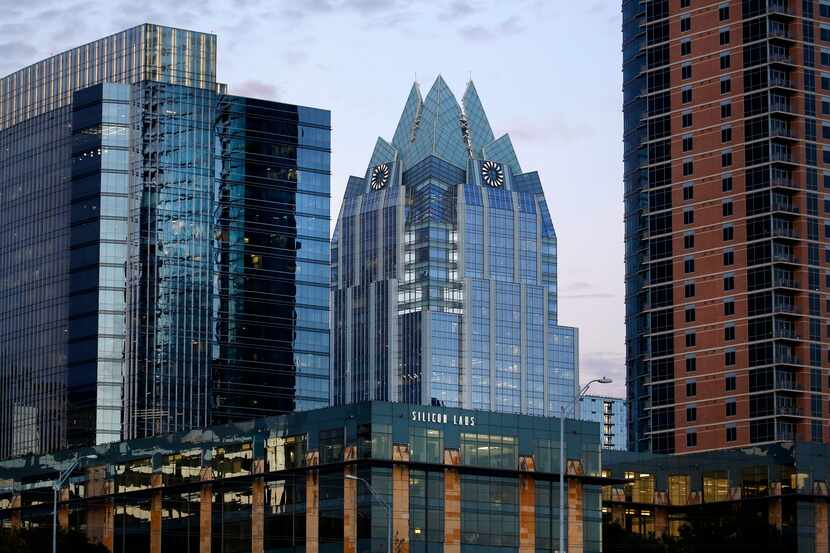 The 515-foot-tall Frost Bank Tower (with spires) is pictured in downtown Austin, Texas. The...