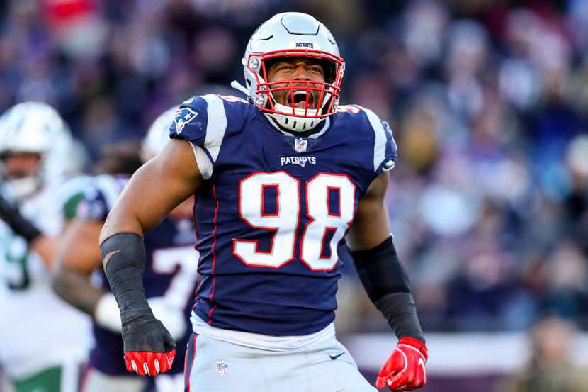 FOXBOROUGH, MASSACHUSETTS - DECEMBER 30: Trey Flowers #98 of the New England Patriots reacts...