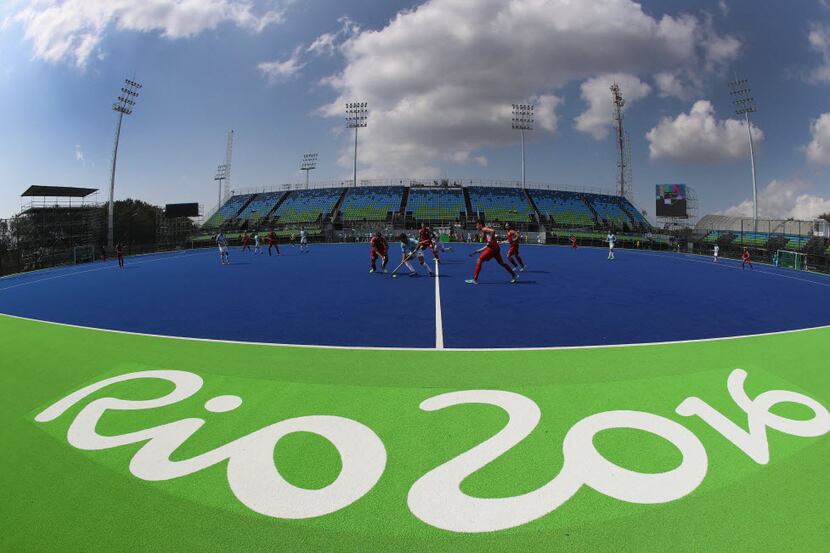 Players from Belgium and Agentina take part in a pre Olympic hockey warm up match at the...