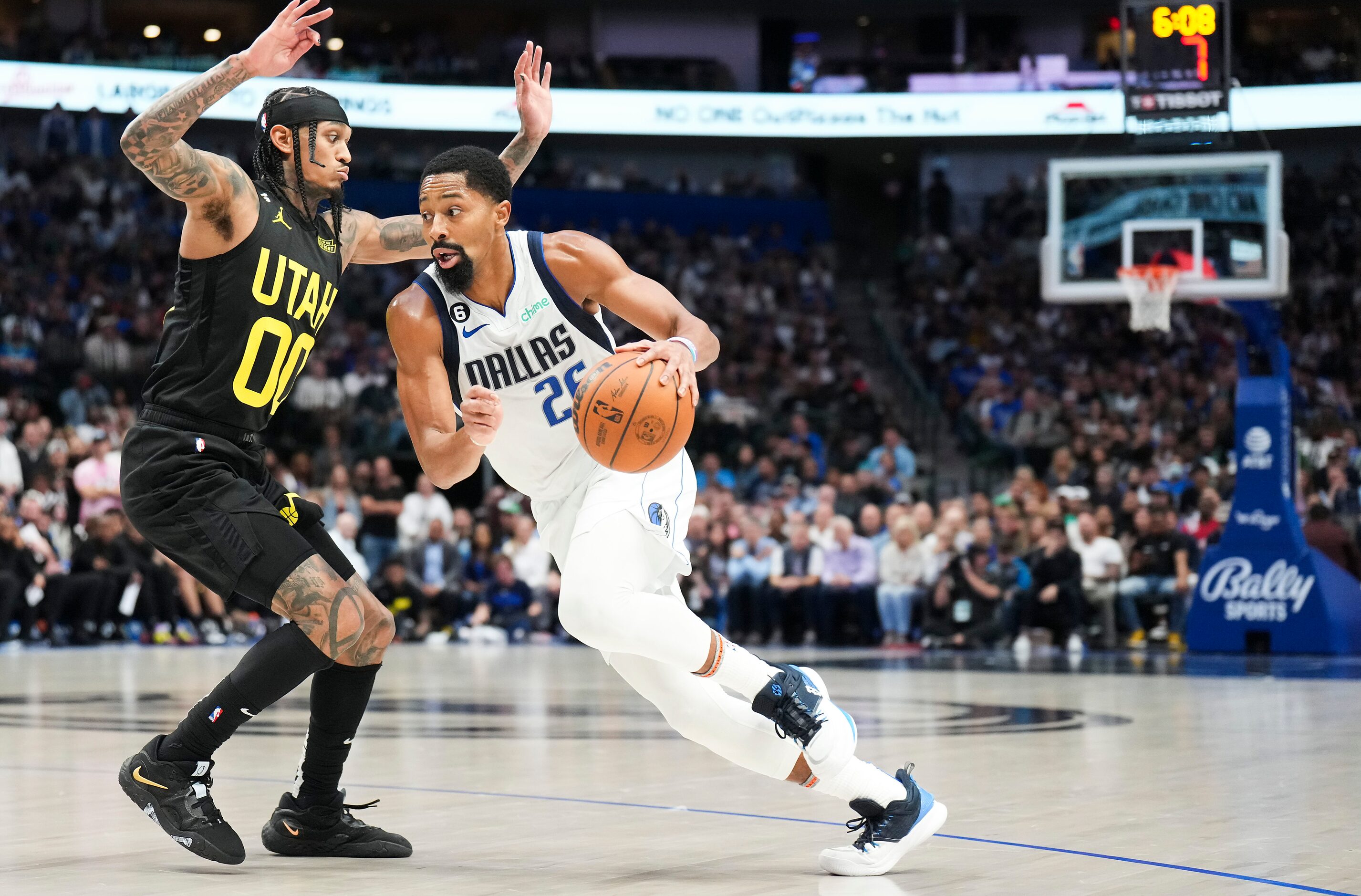 Dallas Mavericks guard Spencer Dinwiddie (26) drives against Utah Jazz guard Jordan Clarkson...