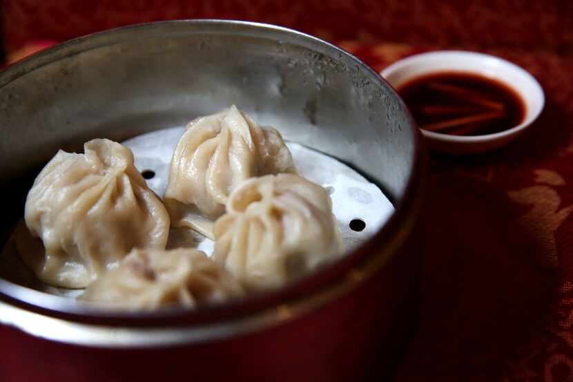 Xiao long bao, also known as soup dumplings, are the highlight on the menu at Shanghai Taste...