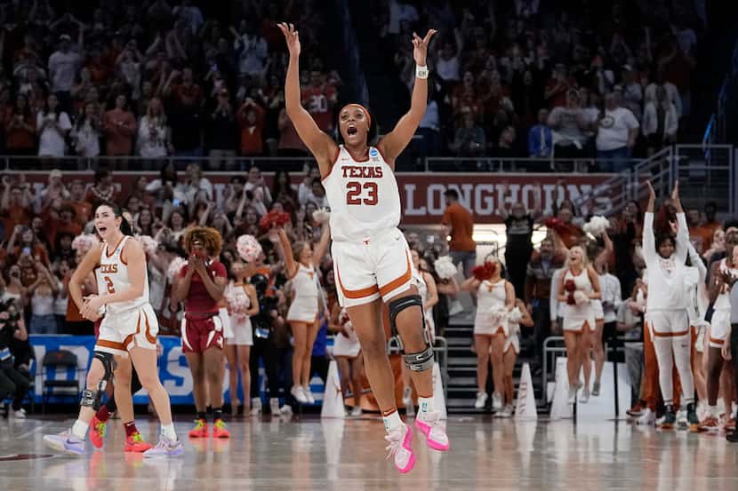 Texas forward Aaliyah Moore (23) celebrates after the team's win over Alabama in a...