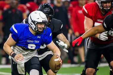 Texas Tech quarterback McLane Carter (6) scrambles during the Red Raiders' spring scrimmage...