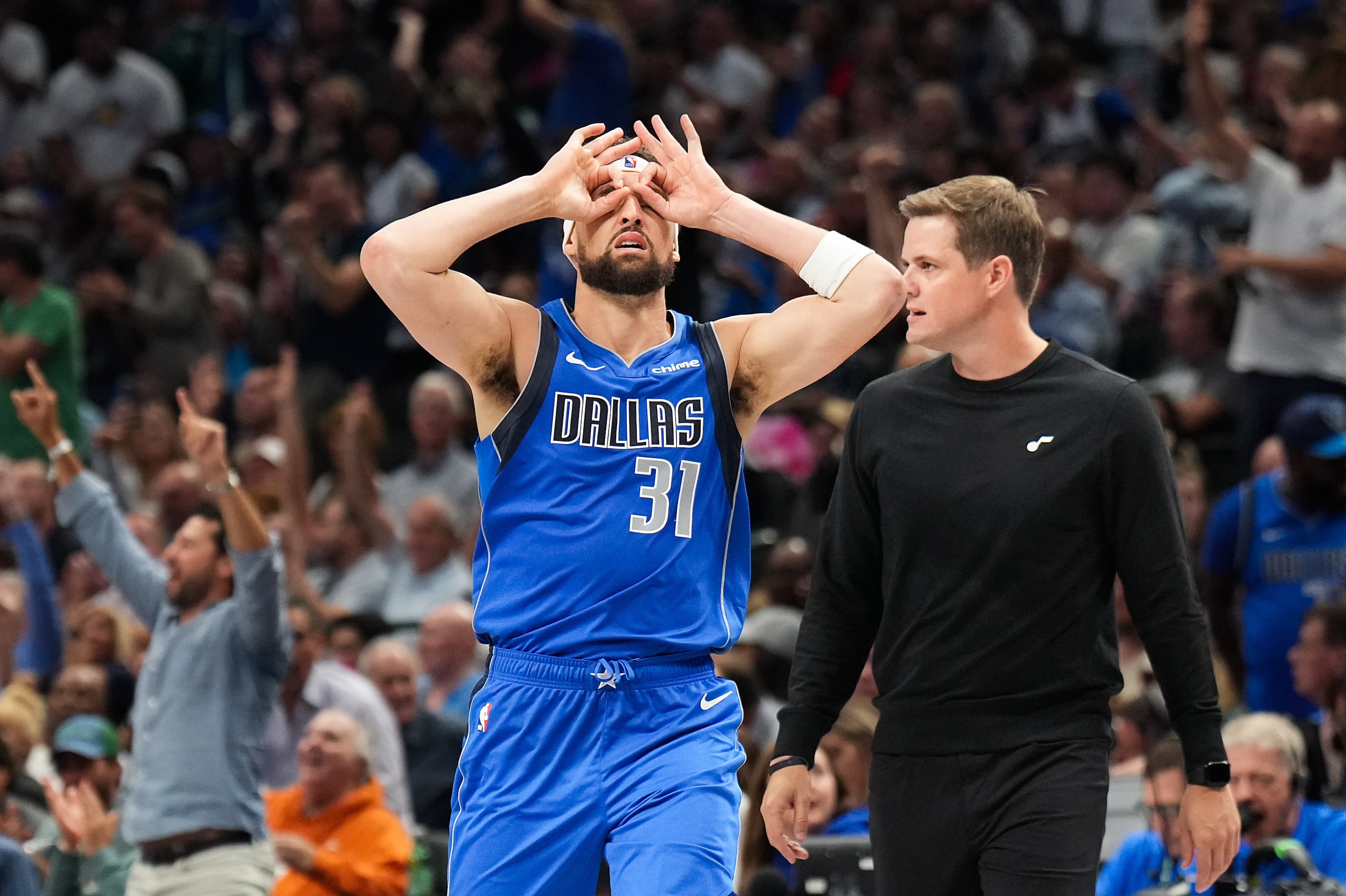 Dallas Mavericks guard Klay Thompson celebrates after hitting 3-pointer as Utah Jazz head...