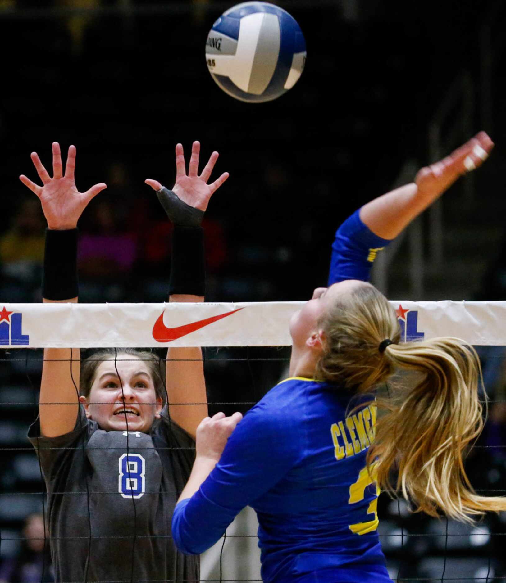 Byron Nelson's Paige Flickinger (8) attempts to block Schertz Clemens' Ashley Breu's (3) hit...