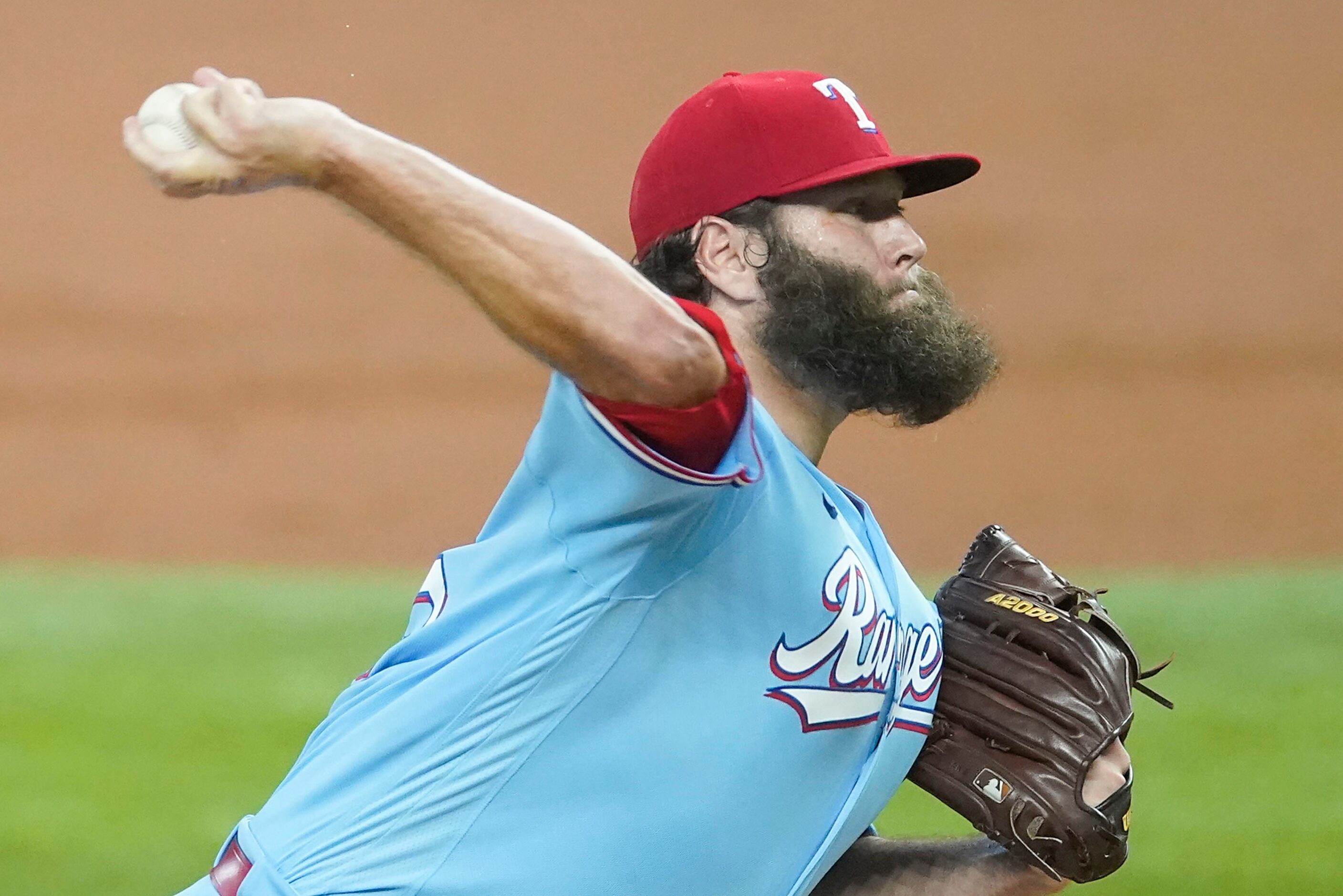 Texas Rangers starting pitcher Lance Lynn delivers during the second inning against the...