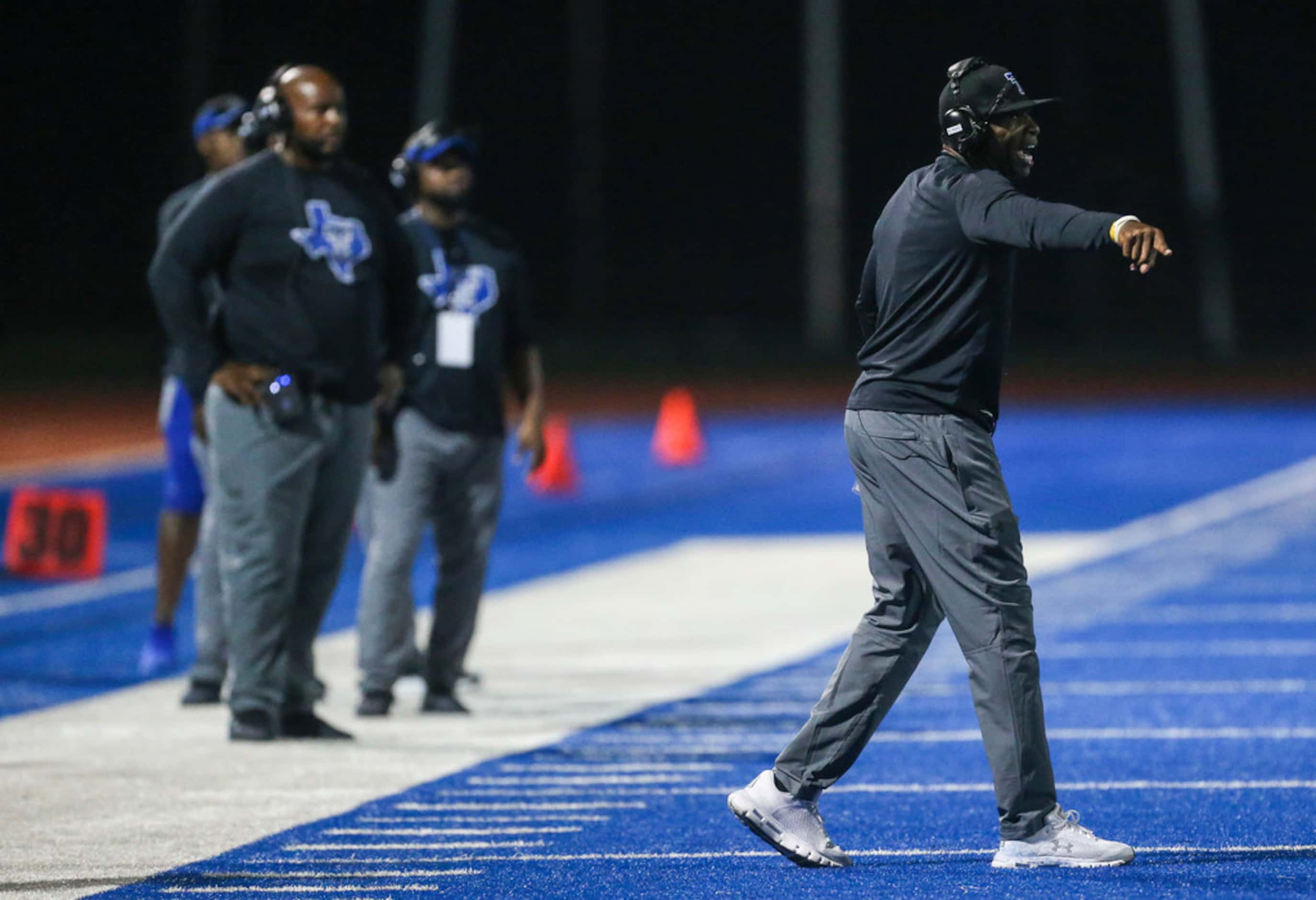 Trinity Christian-Cedar Hill offensive coordinator and retired professional football player...