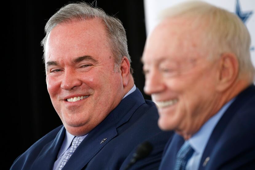 Dallas Cowboys new head coach Mike McCarthy (left) shares a laugh with Dallas Cowboys owner...