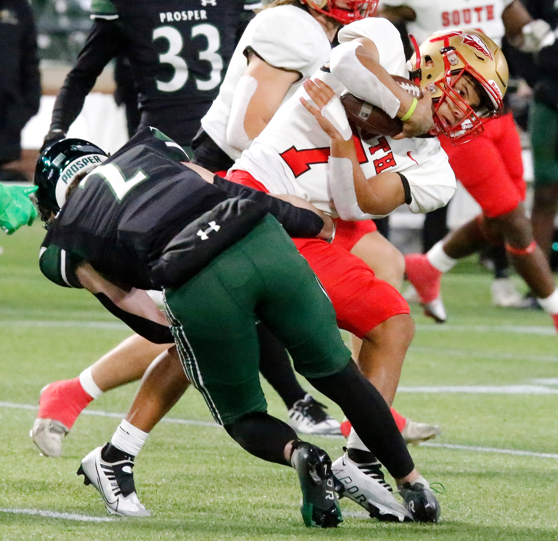 South Grand Prairie High School quarterback Jaden Stanley (7) is tackled by Prosper High...